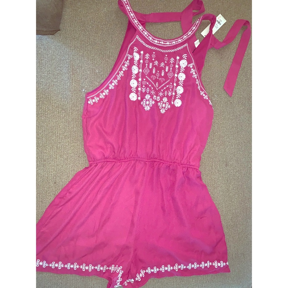 Francesca’s fuchsia romper